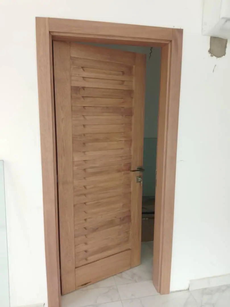 Jalousie door made by Nova Doors in Accra, Ghana (photo 2 of 4)