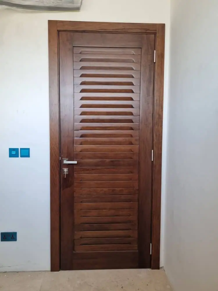 Jalousie door made by Nova Doors in Accra, Ghana (photo 4 of 4)