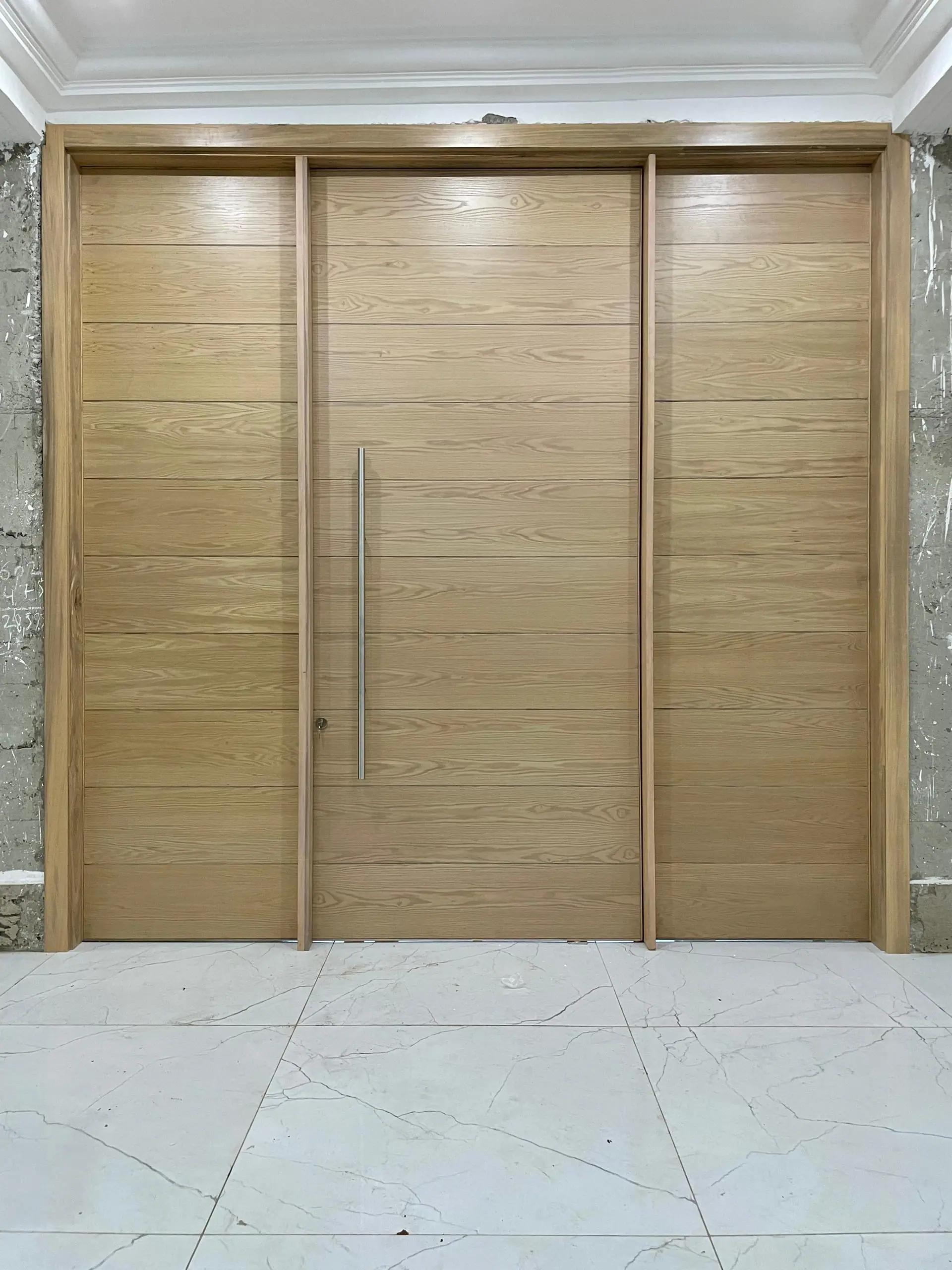 Pivot door made by Nova Doors in Accra, Ghana (photo 1 of 31)