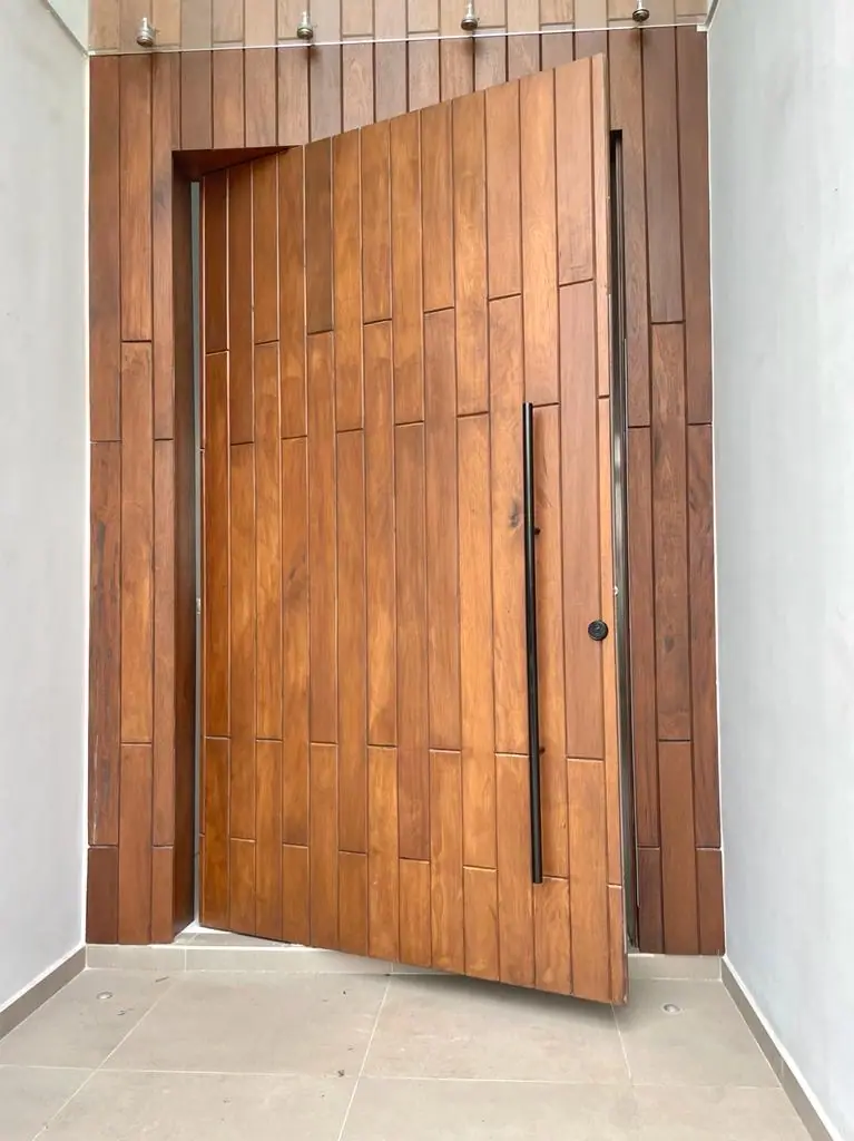 Pivot door made by Nova Doors in Accra, Ghana (photo 3 of 31)