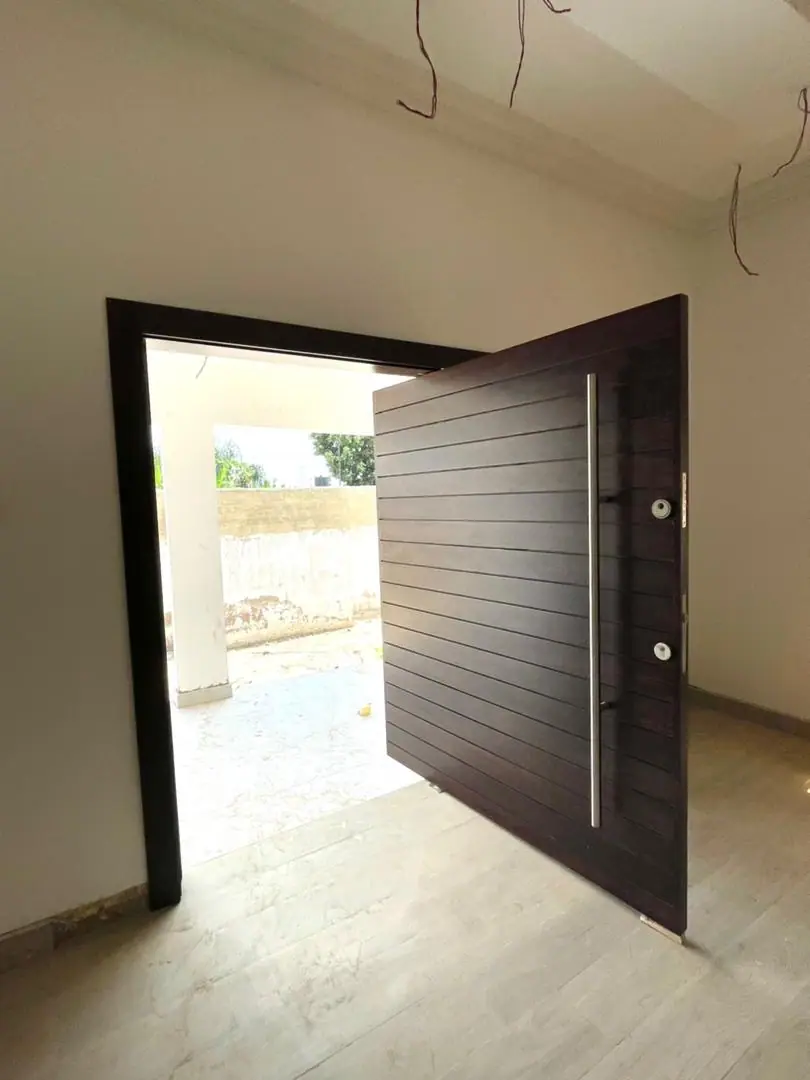 Pivot door made by Nova Doors in Accra, Ghana (photo 7 of 31)