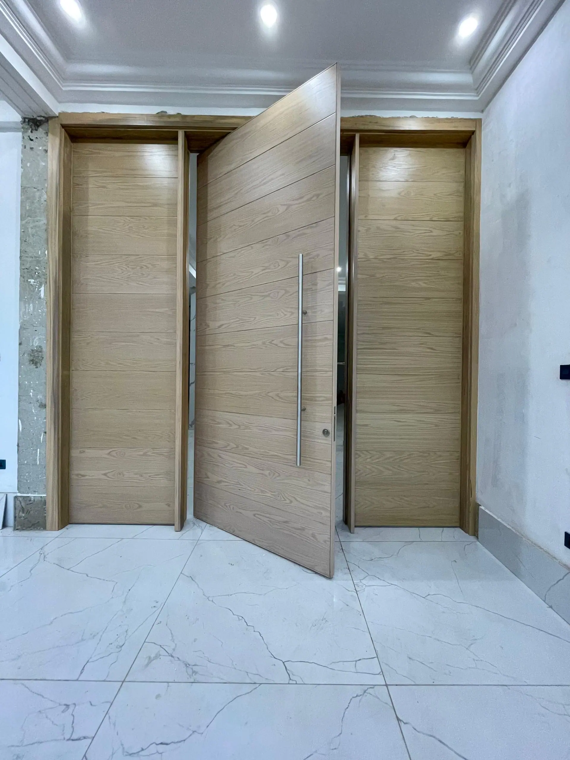 Pivot door made by Nova Doors in Accra, Ghana (photo 12 of 31)