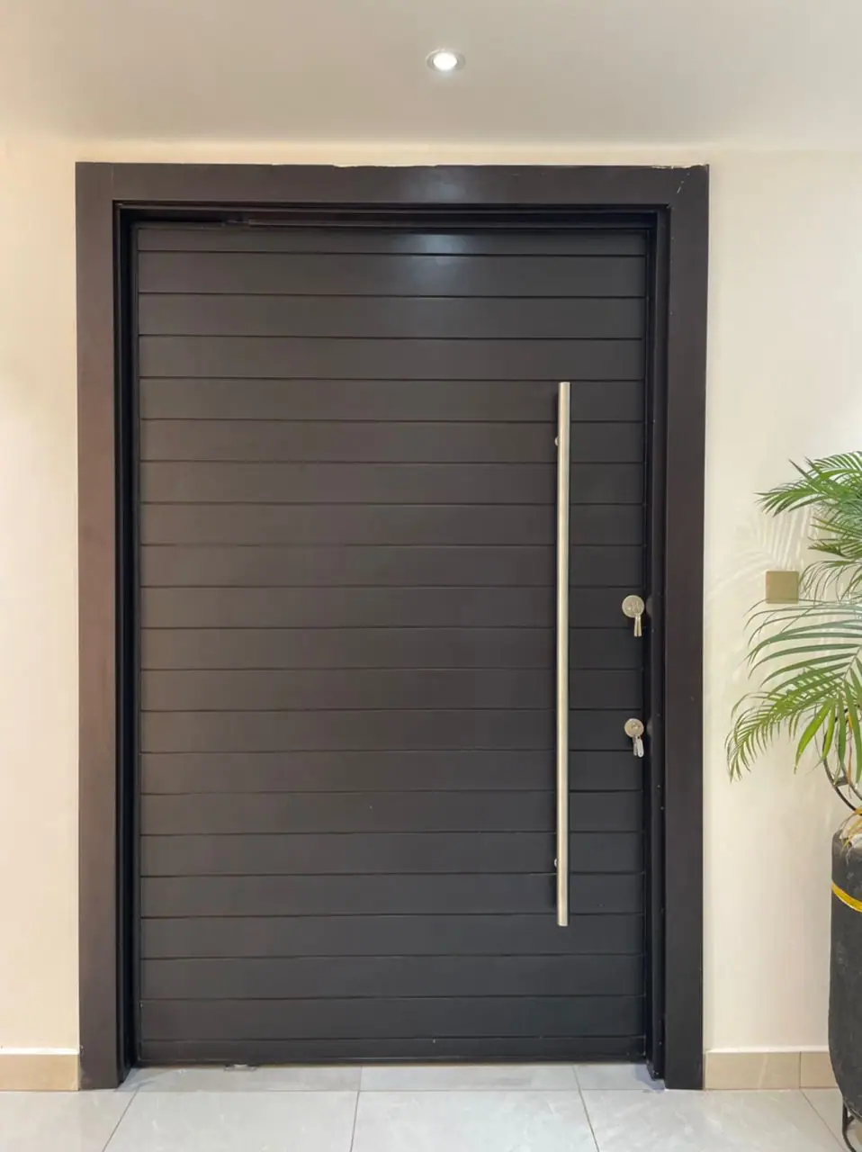 Pivot door made by Nova Doors in Accra, Ghana (photo 13 of 31)
