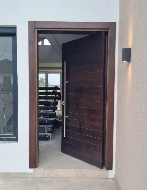Pivot door made by Nova Doors in Accra, Ghana (photo 15 of 31)