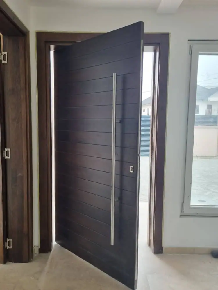 Pivot door made by Nova Doors in Accra, Ghana (photo 21 of 31)