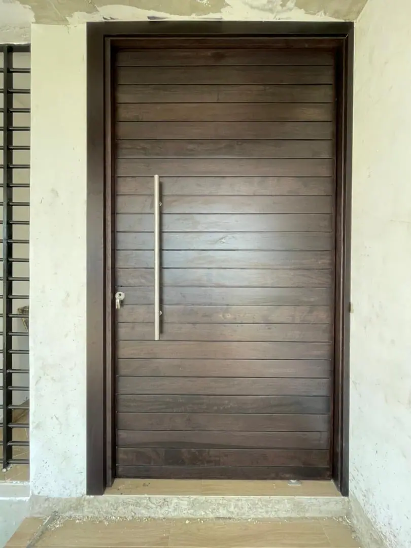 Pivot door made by Nova Doors in Accra, Ghana (photo 28 of 31)