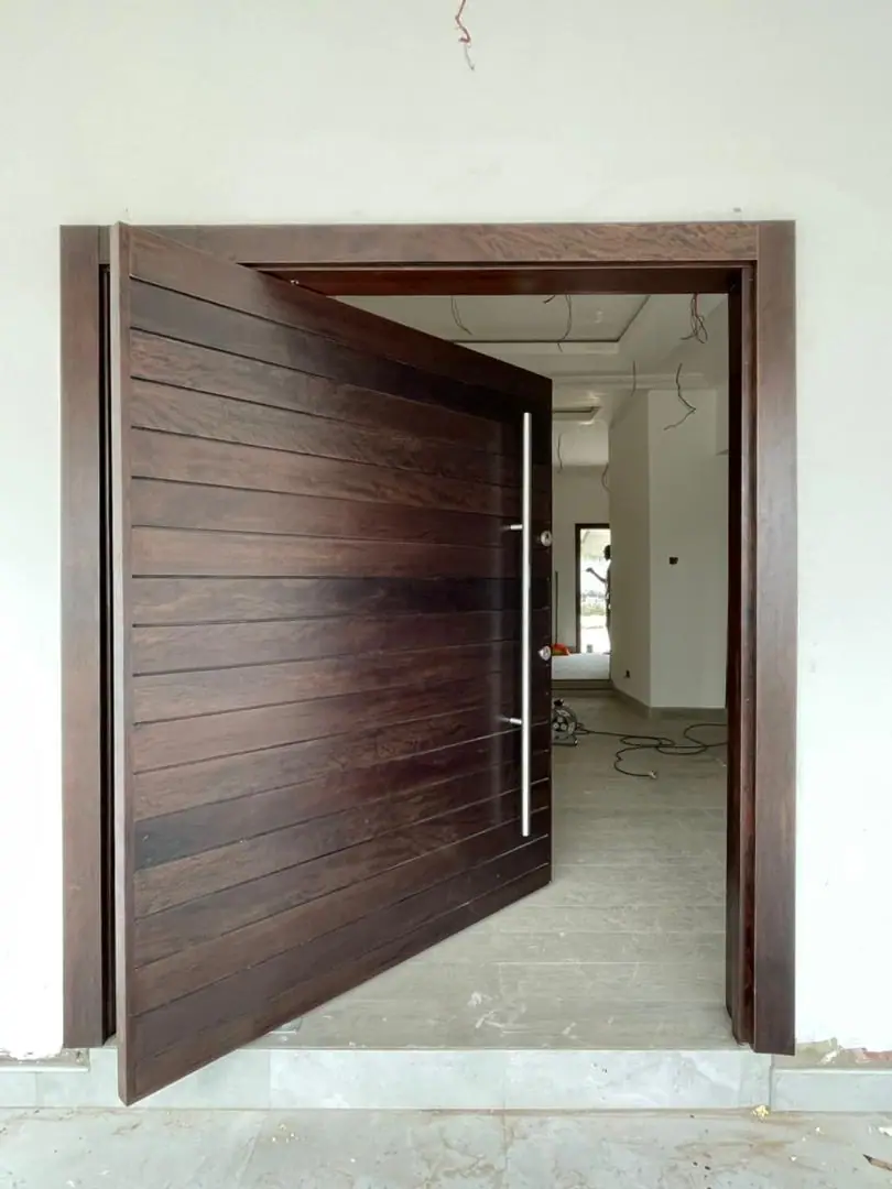 Pivot door made by Nova Doors in Accra, Ghana (photo 29 of 31)