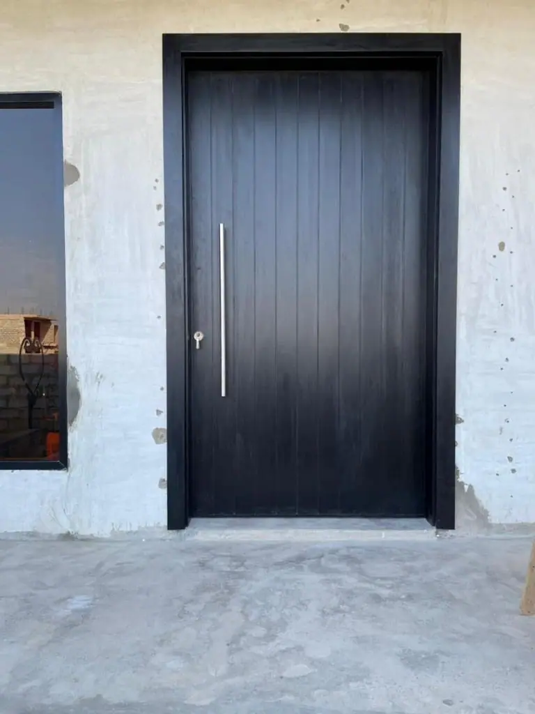 Solid wood door made by Nova Doors in Accra, Ghana (photo 1 of 13)