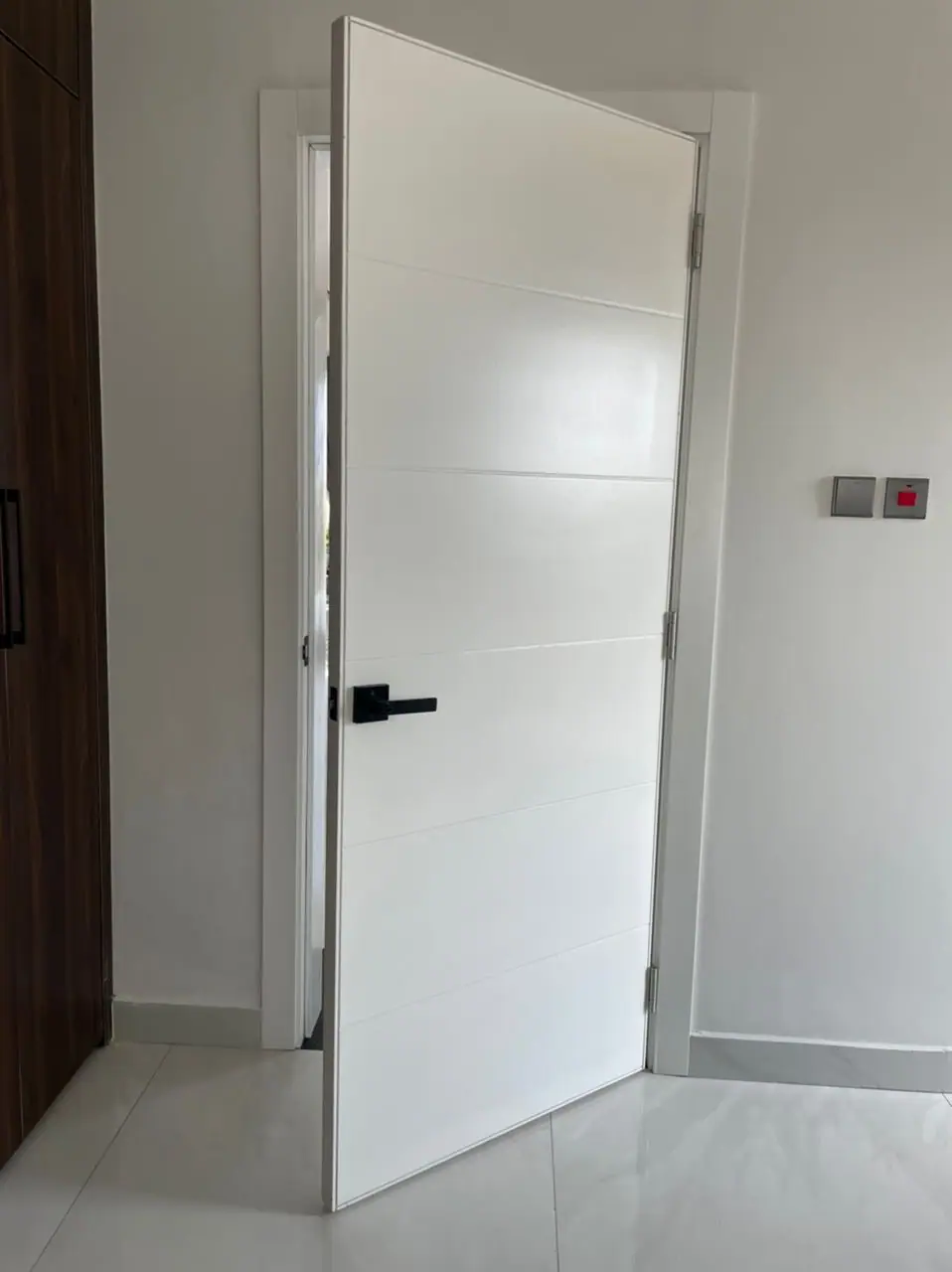 White door made by Nova Doors in Accra, Ghana (photo 1 of 9)
