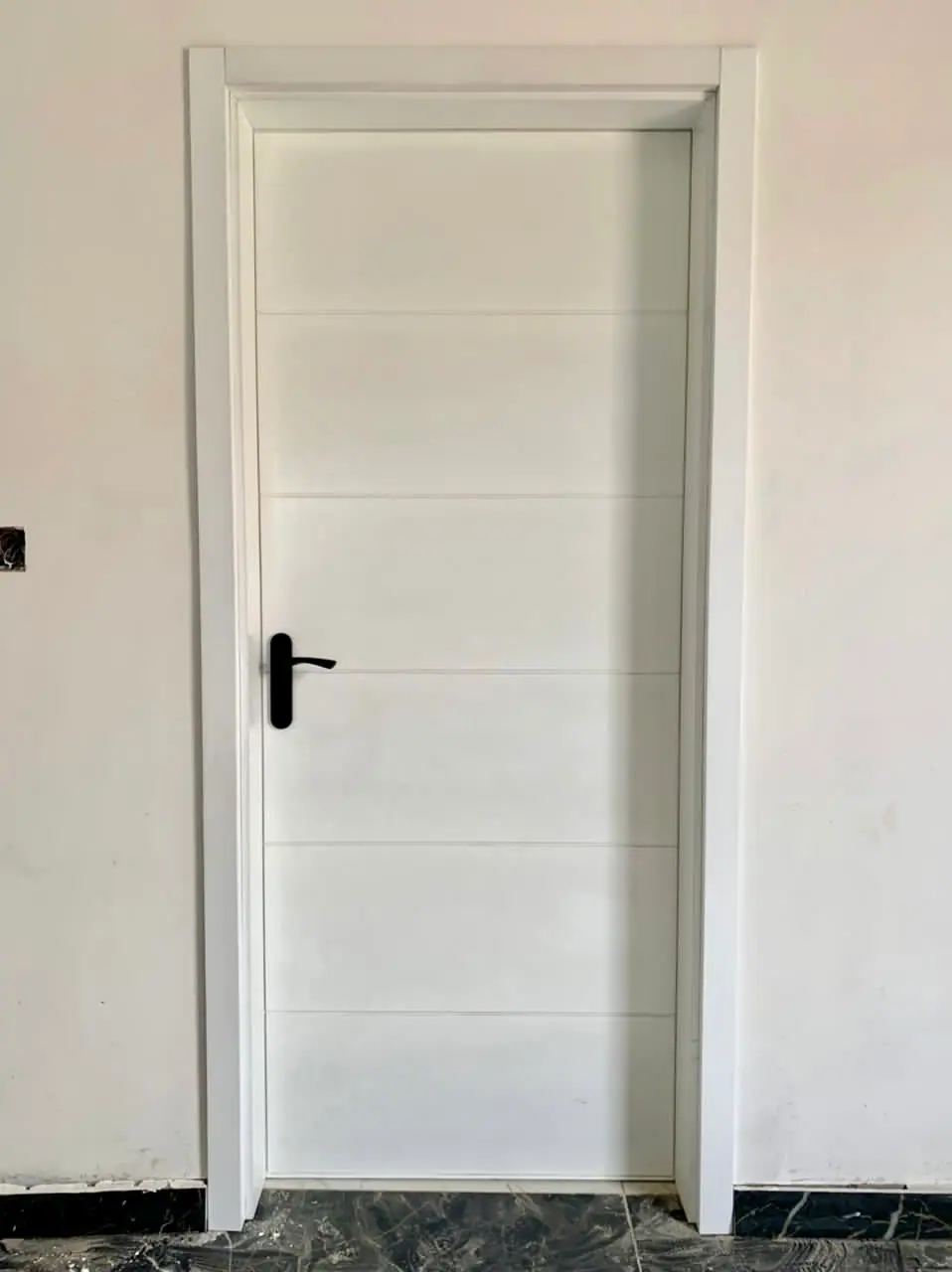 White door made by Nova Doors in Accra, Ghana (photo 2 of 9)