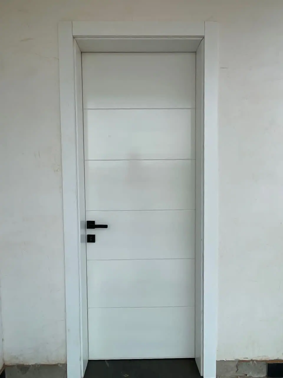 White door made by Nova Doors in Accra, Ghana (photo 5 of 9)