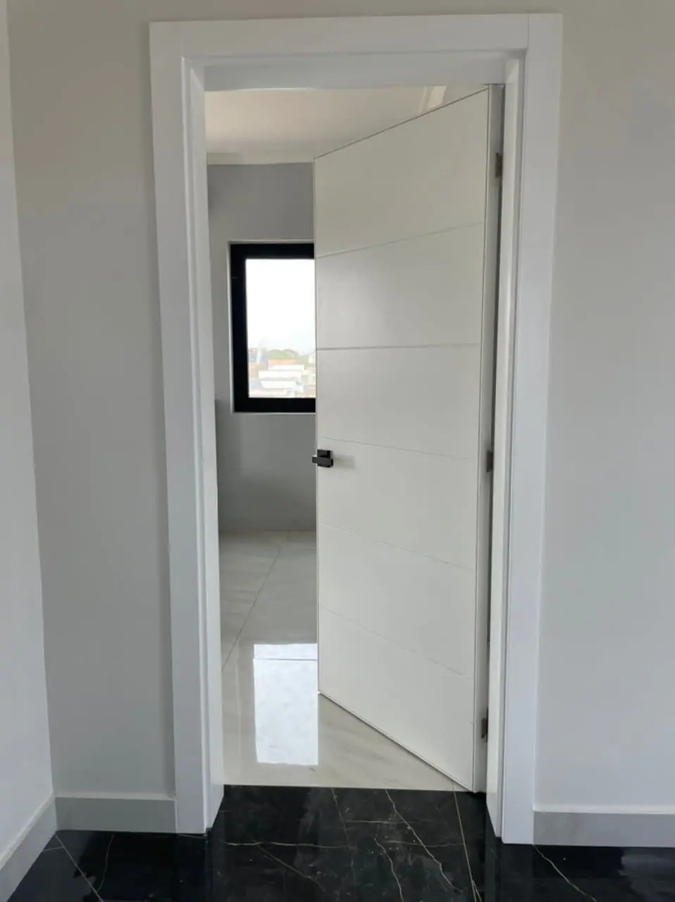 White door made by Nova Doors in Accra, Ghana (photo 6 of 9)