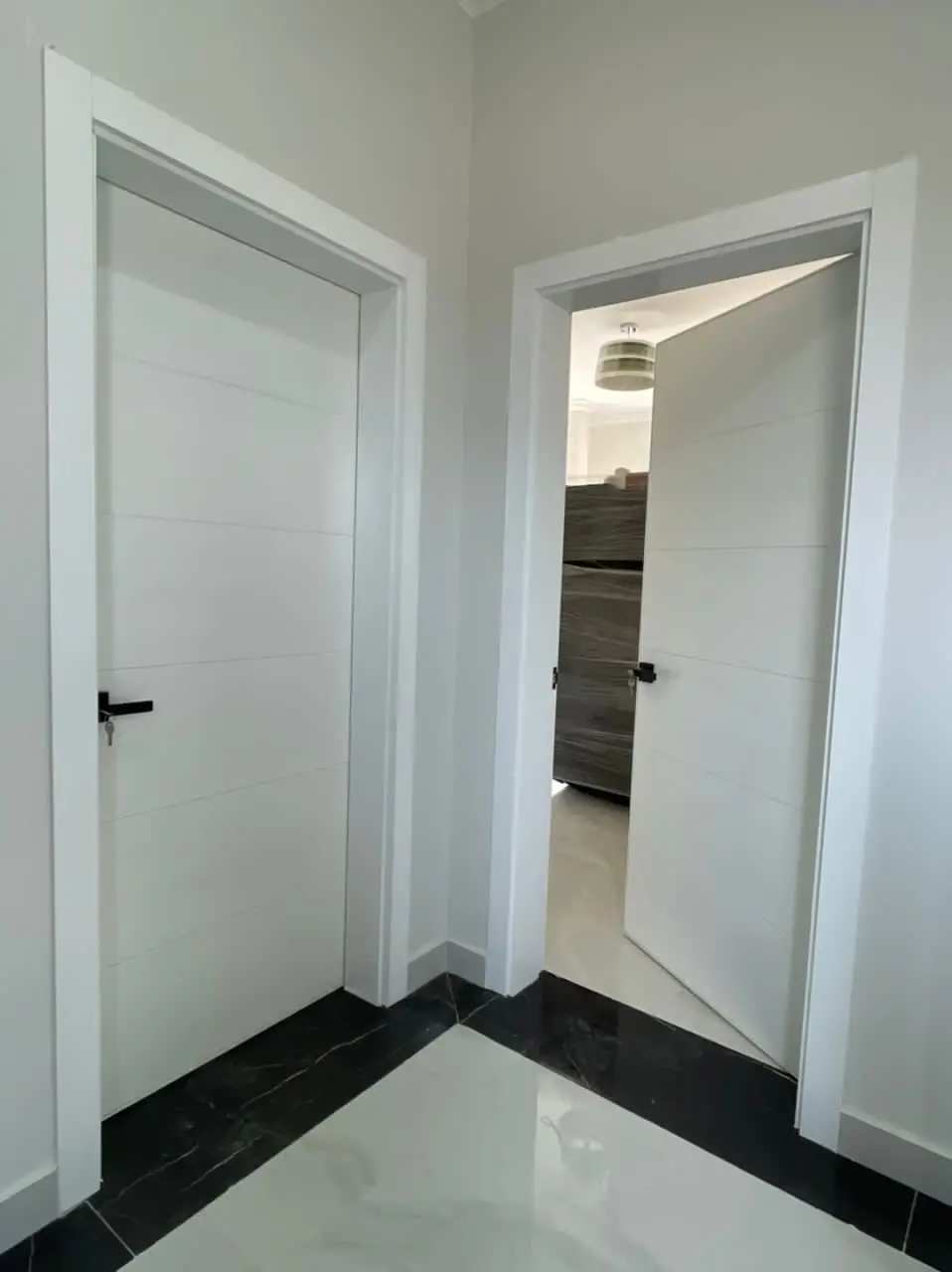 Custom white door made by Nova Doors in Accra, Ghana